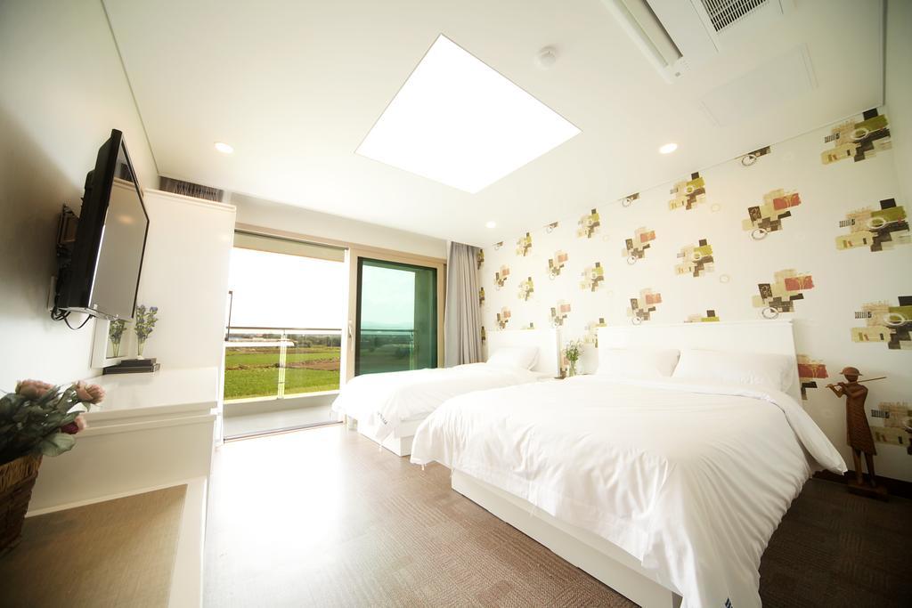 Sea View Hotel Jeju Quarto foto