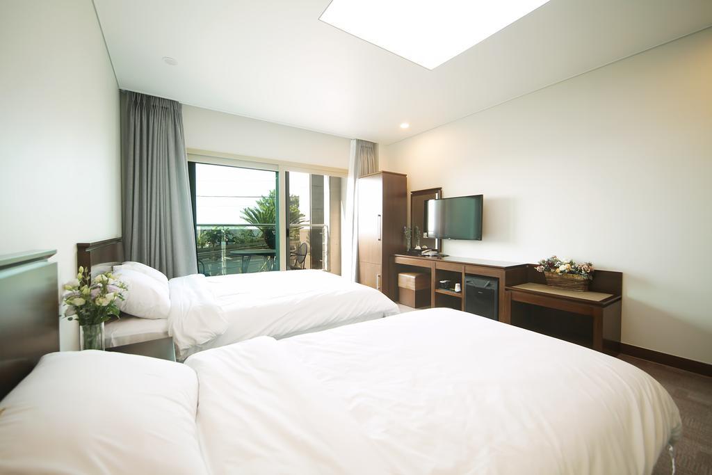 Sea View Hotel Jeju Quarto foto
